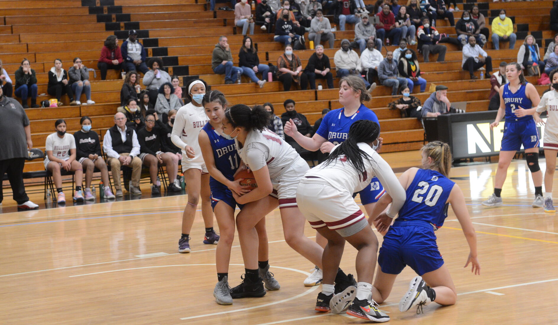 Felix and Mitchell fight for possession